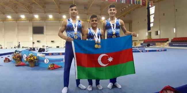 Gimnastlarımız Gürcüstandan medallarla qayıdır
